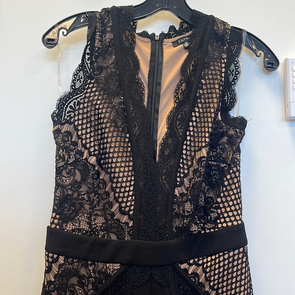 Worn once entry jump suit size medium